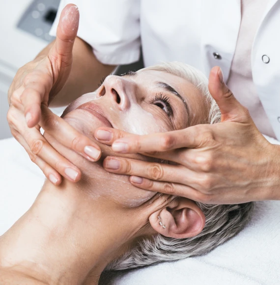 mature-woman-having-face-massaged
