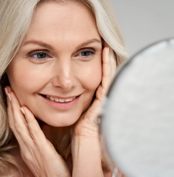 mature-woman-looking-in-mirror-page